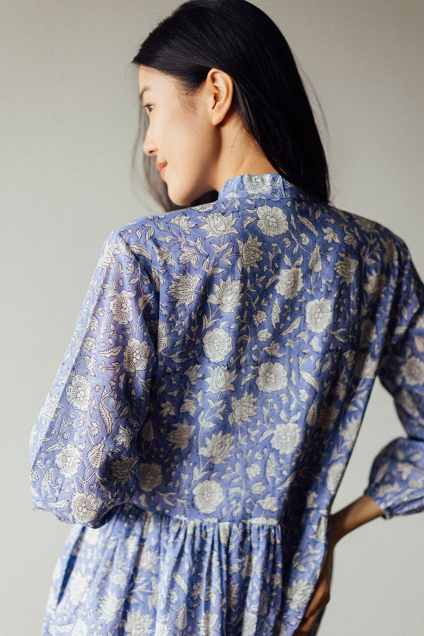 Back View of Artful House Lily Mini Dress. Floral patterned Indian block print fabric