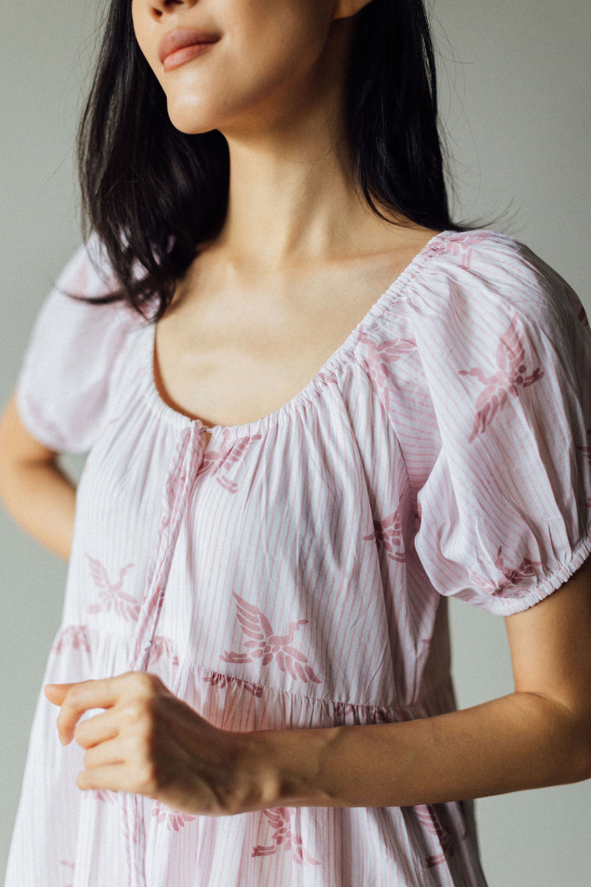 Front neck detail of block print midi dress