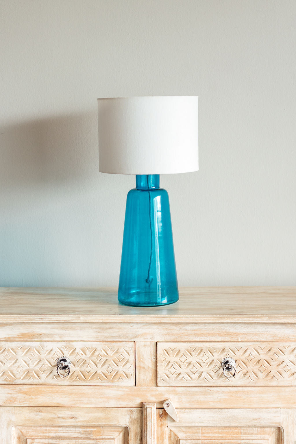 clear blue glass lamp