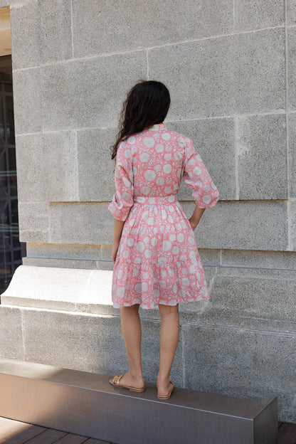 Breathable hand block printed cotton mini dress with lining and pockets in soft peach floral print for summer styling