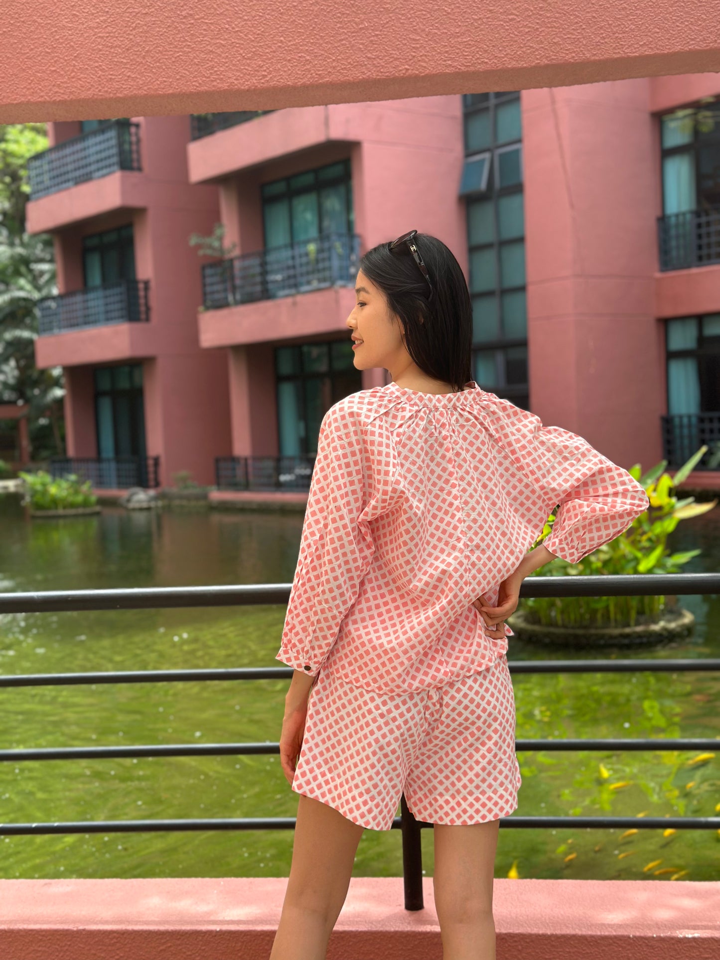 Casual coral pink block print shorts and top set for warm weather dressing